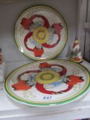 2 large Wedgwood Clarice Cliff plates and sugar sifter