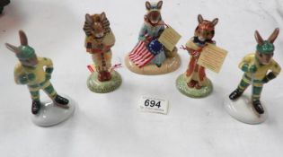 5 Royal Doulton bunnikin figures including 2 Hockey,