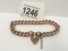 A 9ct gold bracelet with padlock,