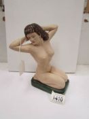 A 1930's plaster fairground nude figure