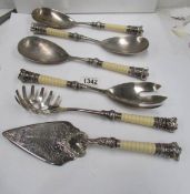 6 unusual serving items with crown handles including cake slice, spaghetti server,