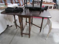 An oak gate leg table