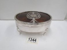 A large silver plated trinket pot with inlaid faux tortoiseshell lid