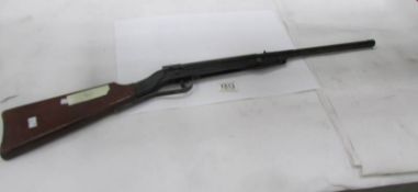 A pre-war tin plate child's rifle