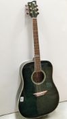 A Jay Turser acoustic 6 string guitar in immaculate condition with soft padded case