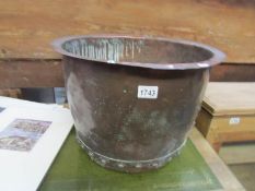 A large copper pot