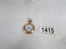 A 14 ct gold ladies fob watch in working order