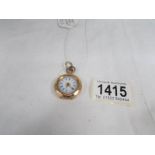 A 14 ct gold ladies fob watch in working order