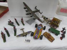 A mixed lot including model fighter plane, horse and cart,