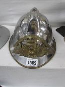 A French Sapeurs Pompiers Saints Cyprien fireman's helmet used by Fournet Thierry