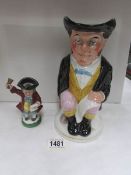 A Victorian Staffordshire Toby jug and one other
