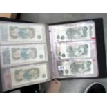 A folder of 61 English bank notes