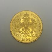An 1892 gold Austrian 20 franc coin