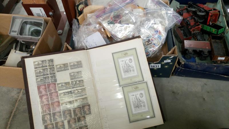 An album of GB stamps and a large quantity of GB and world stamps