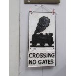 A cast railway sign 'Crossing No Gates'