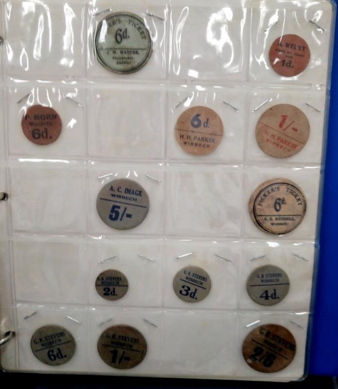 A folder of milk bottle tops, fruit pickers tokens, - Image 12 of 12