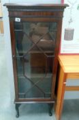 A mahogany astragal glazed display cabinet