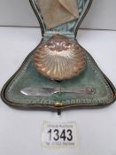 A cased HM silver scallop shell dish and knife,