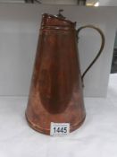 An insulated copper jug by W A S Benson,