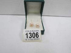 A pair of silver set cultured pearl earrings