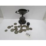 160 grams of silver coins and a silver trophy