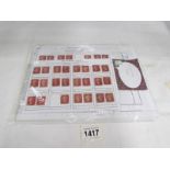 A collection of penny red stamps