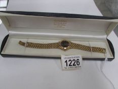 A Gucci ladies gold plated wrist watch,