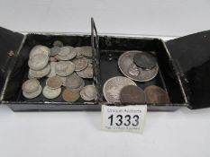 A quantity of British and European coins including silver,