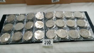 A folder of 72 GB and foreign forged coins