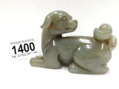 A Chinese 18th/19th century jade figure of a dog