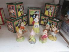 A Boxed Royal Doulton Snow White and 6 of the dwarfs (missing Sleepy)