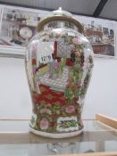 A large hand painted oriental lidded jar (repair to rim)