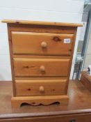 A pine 3 drawer bedside chest