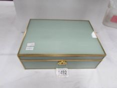 An onyx jewellery box in as new condition