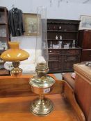 A brass Aladdin oil lamp with chimney