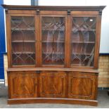 A 20th century Sheriton style curved mahogany bookcase in good order