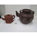 A Yixing large clay teapot and a 19th century Yixing teapot (signed)