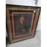A gilt framed portrait of a gentleman in a mahogany case