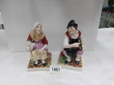 A pair of 19th century Staffordshire figures