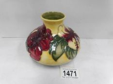 A Moorcroft pottery Hibiscus pattern squat vase