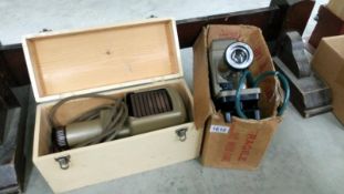 A boxed 'Kodaslide' slide projector and one other