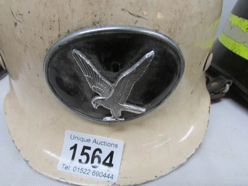 An old fireman's helmet marked Falck on sides - Image 2 of 2