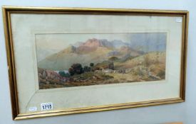 A watercolour rural landscape featuring hills (possibly Welsh) initialled A M C (glass a/f)