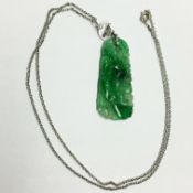 A Chinese grade A apple green jadeite jade necklace mounted with one button pearl and 6 rose cut