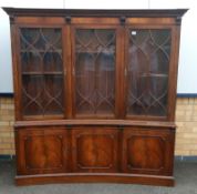 A 20th century Sheriton style curved mahogany bookcase in good order