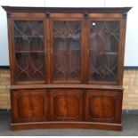 A 20th century Sheriton style curved mahogany bookcase in good order