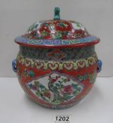 An oriental lidded temple jar with dog of fo knob