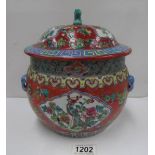 An oriental lidded temple jar with dog of fo knob