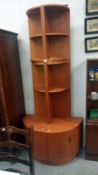 A pair of 1970's teak retro G plan corner cabinets