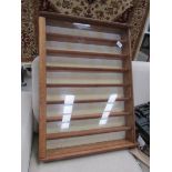 An 8 shelf wall display cabinet